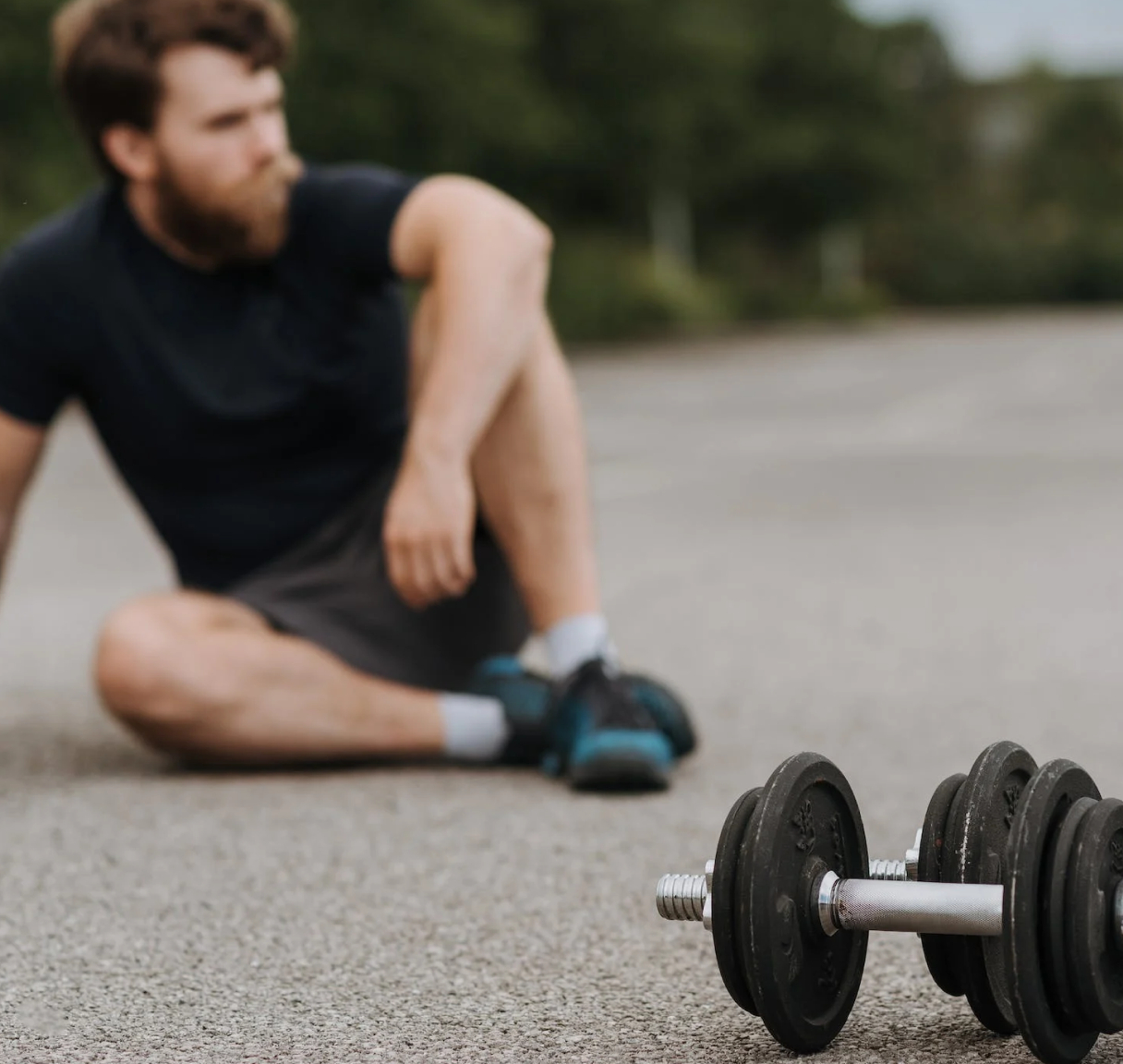 Fit man with weights